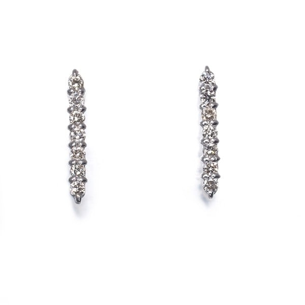 Diamond 0.10Ct/ 0.10Ct 7P Earrings 18K 750 White Gold: Diamond 0.10Ct/ 0.10Ct 7P Earrings 18K 750 White Gold Diamond earrings featuring two natural diamonds, each weighing 0.10 carats and certified as 7P (very high color grade), are set in 18k white