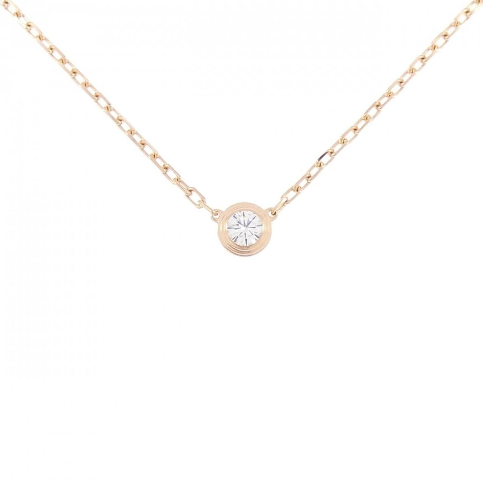 Damour Small Necklace from Cartier: Damour Small Necklace from Cartier Pink gold (18K) Damour Small Necklace from Cartier, featuring a 4.4mm pendant with a neck circumference that fits 38-41cm women. This used necklace showcases a few