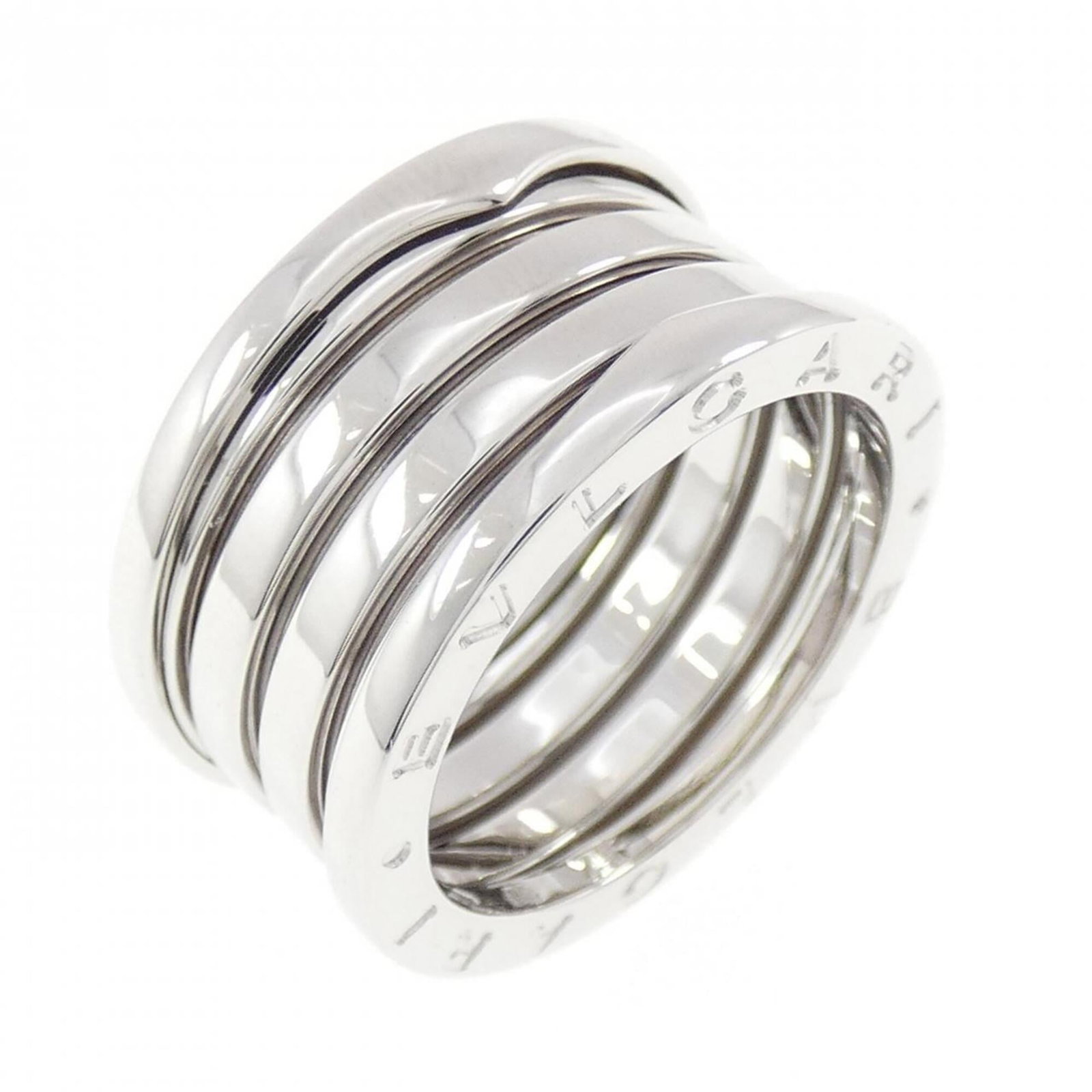Bvlgari Band Ring White Gold (18K): Bvlgari Band Ring White Gold (18K) Bvlgari Band Ring White Gold (18K) features a sleek design in 18K white gold, perfect for adding a touch of luxury to any outfit. With its classic band style and sub