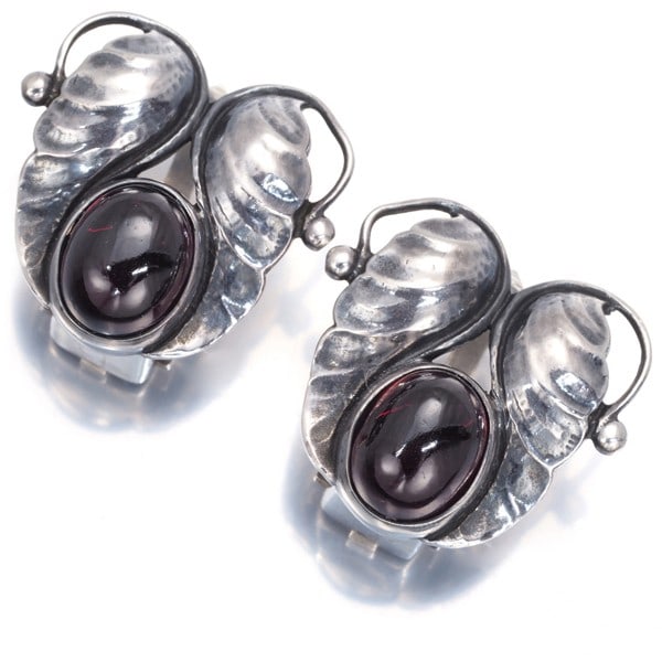 Georg Jensen Earrings Garnet 925 Sterling Silver: Georg Jensen Earrings Garnet 925 Sterling Silver Sterling silver earrings featuring a natural garnet, crafted from high-quality metal. The clip-on design makes them easy to wear, while the 925 purity 
