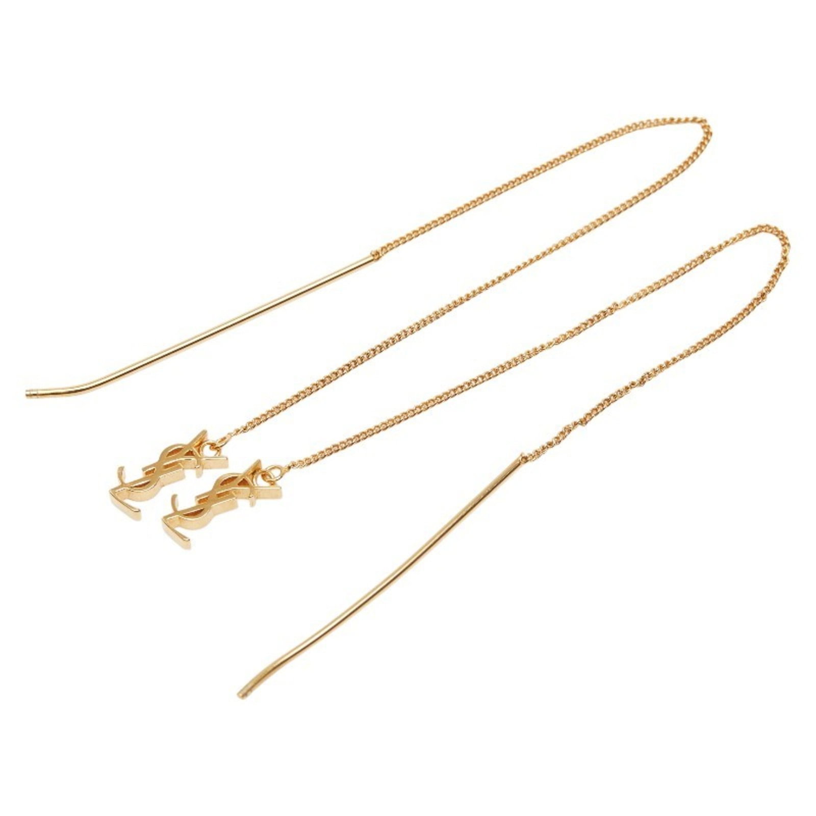 Yves Saint Laurent Stud Earrings: Yves Saint Laurent Stud Earrings Stud earrings from Yves Saint Laurent, featuring a gold finish and subtle design. These used earrings show signs of wear, with minor scratches and dirt, but remain in 