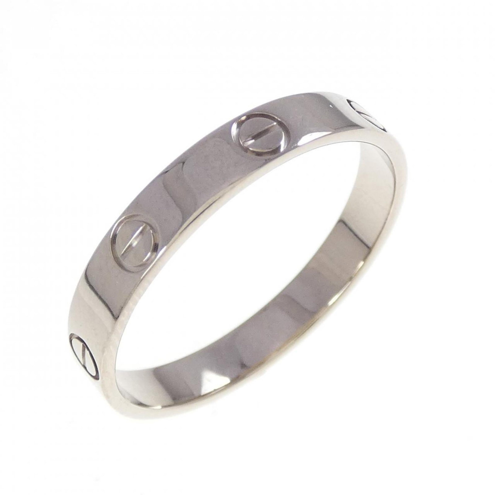 White Gold Cartier Band Ring 18K: White Gold Cartier Band Ring 18K White Gold Cartier Band Ring 18K features a classic design with a few traces of usage, some scratches / dirt visible. Overall in very good condition, bearing the