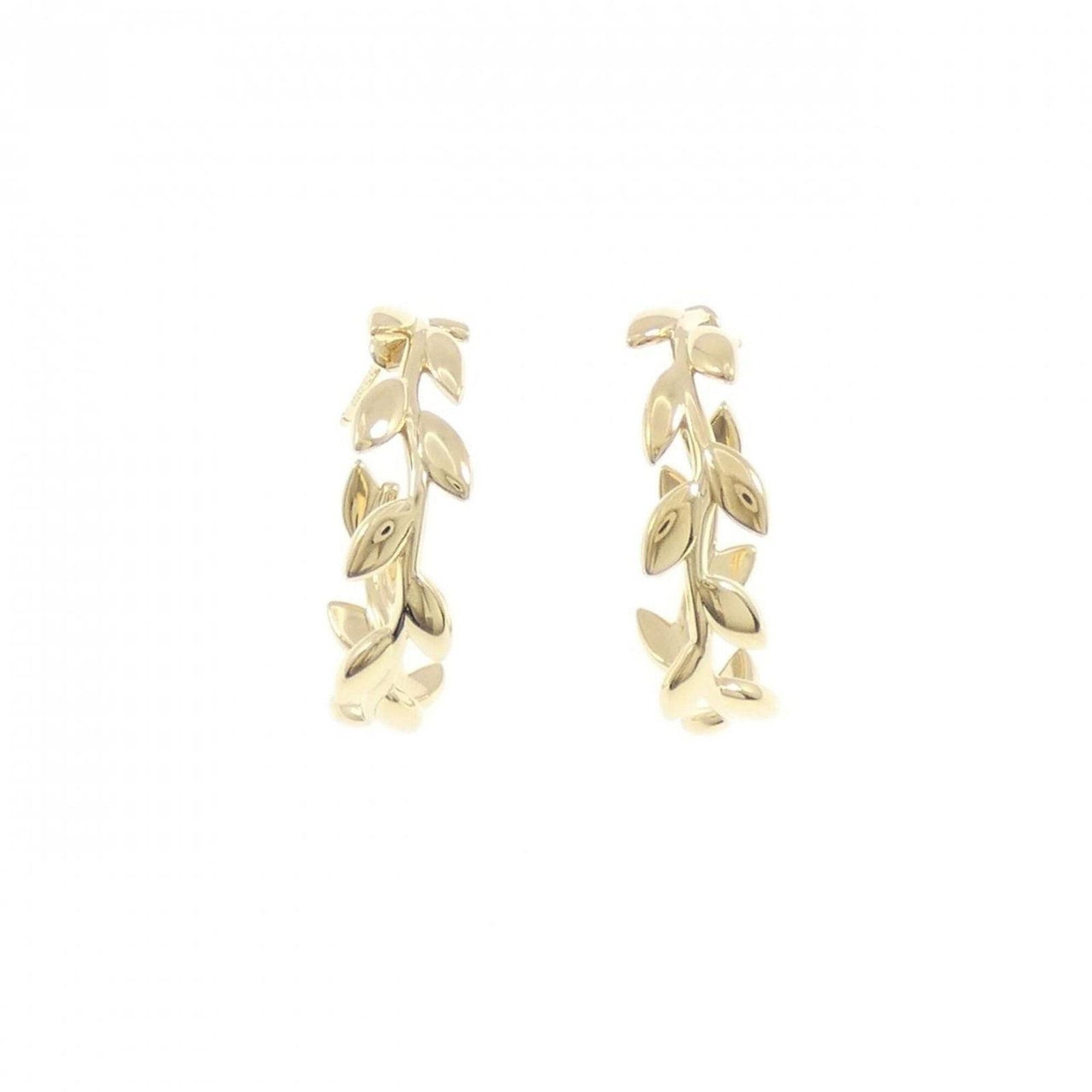 Yellow Gold Hoop Earrings by Tiffany: Yellow Gold Hoop Earrings by Tiffany Yellow Gold Hoop Earrings by Tiffany - A timeless and elegant accessory, these 18K yellow gold hoop earrings showcase the iconic style of Tiffany. With a few trace