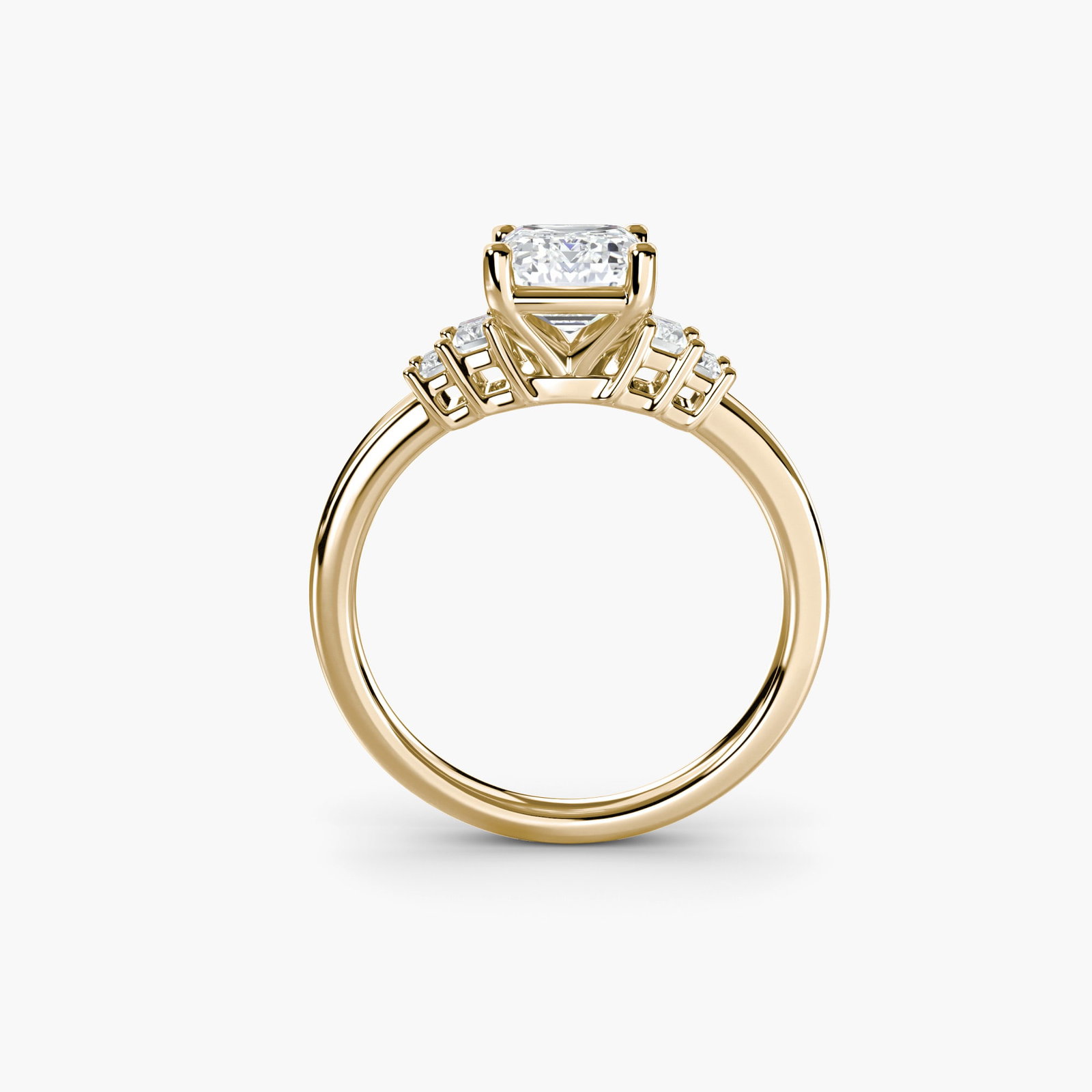 Solitaire Emerald 18Kt Yellow Gold Ring Setting: Solitaire Emerald 18Kt Yellow Gold Ring Setting 18Kt Yellow Gold Solitaire Emerald Ring Setting. This elegant ring features a sturdy 3.61 carat metal weight setting, adorned with four lab-grown side