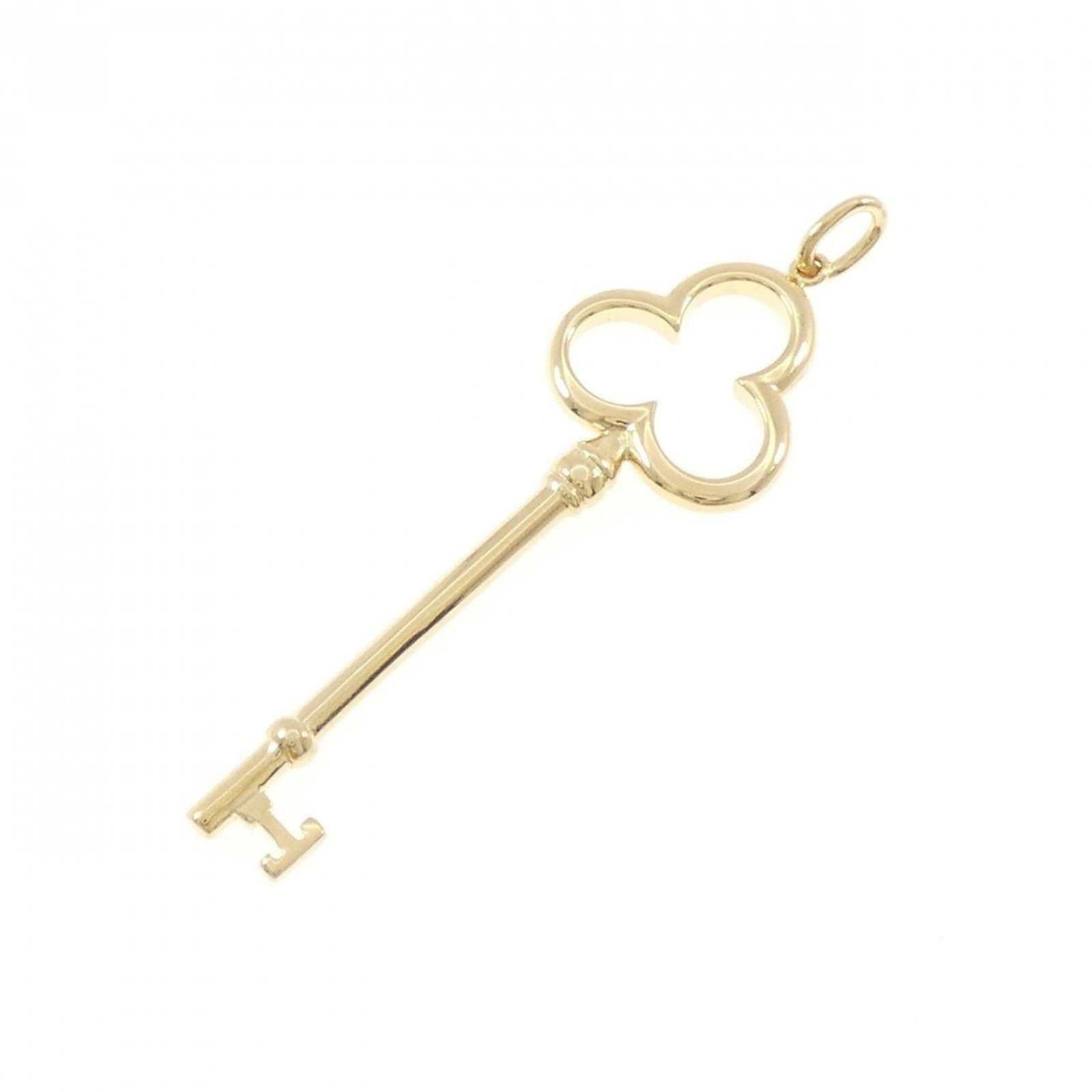 Tiffany Co Trefoil Key Pendant: Tiffany Co Trefoil Key Pendant Yellow Gold (18K) Trefoil Key Pendant, featuring a classic Tiffany design with intricate details. The pendant measures 58.9mm x 17.3mm and is made from high-quality