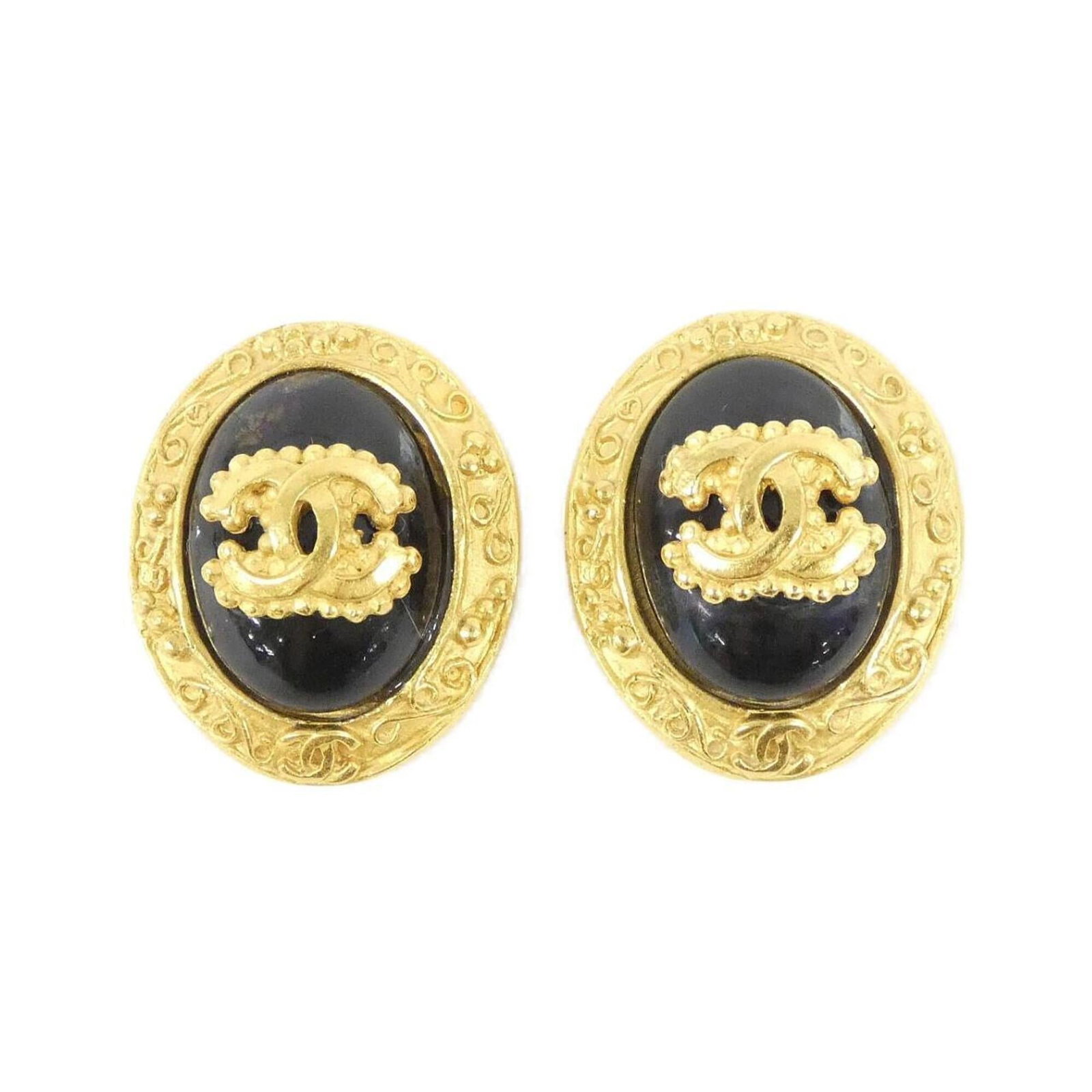 Chanel Clip Earrings: Chanel Clip Earrings Chanel Clip Earrings in sleek black, featuring a timeless design that adds a touch of sophistication to any outfit. Made with durable materials, these earrings showcase a few subt