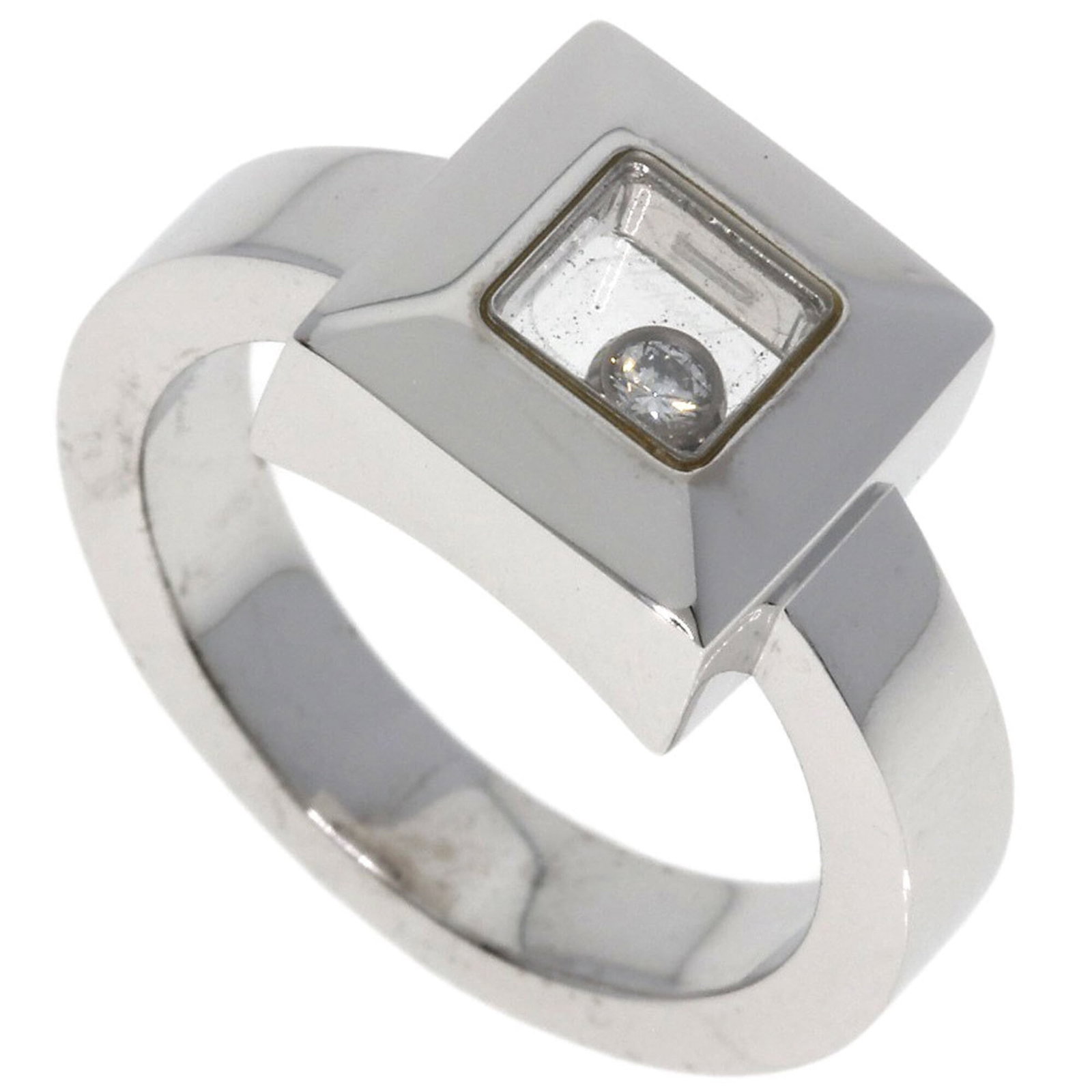 Chopard 18k White Gold Band Ring: Chopard 18k White Gold Band Ring Chopard's 18k white gold band ring boasts elegance with its refined design, crafted from high-quality white gold. The item exhibits traces of usage and minor scratches
