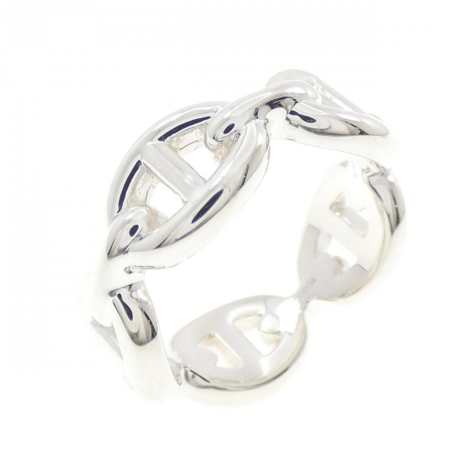 Ring Hermes Silver Band 925: Ring Hermes Silver Band 925 Silver band ring from Hermes, made from high-quality silver (925) with a sleek and modern design. This used item has hardly any traces of usage, making it look like new,