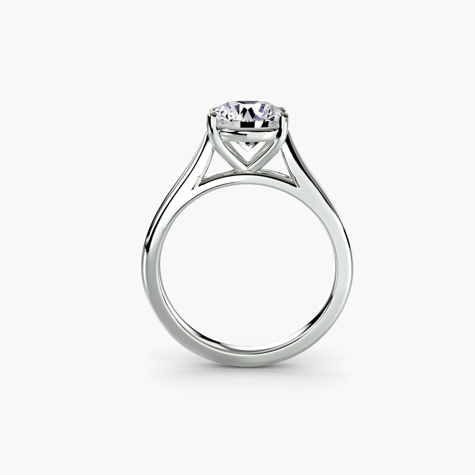 Solitaire Round 18Kt White Gold Ring Setting: Solitaire Round 18Kt White Gold Ring Setting 18Kt white gold solitaire ring setting with a round shape and 2mm band width, perfect for showcasing a lab-grown diamond. This new ring features a metal we