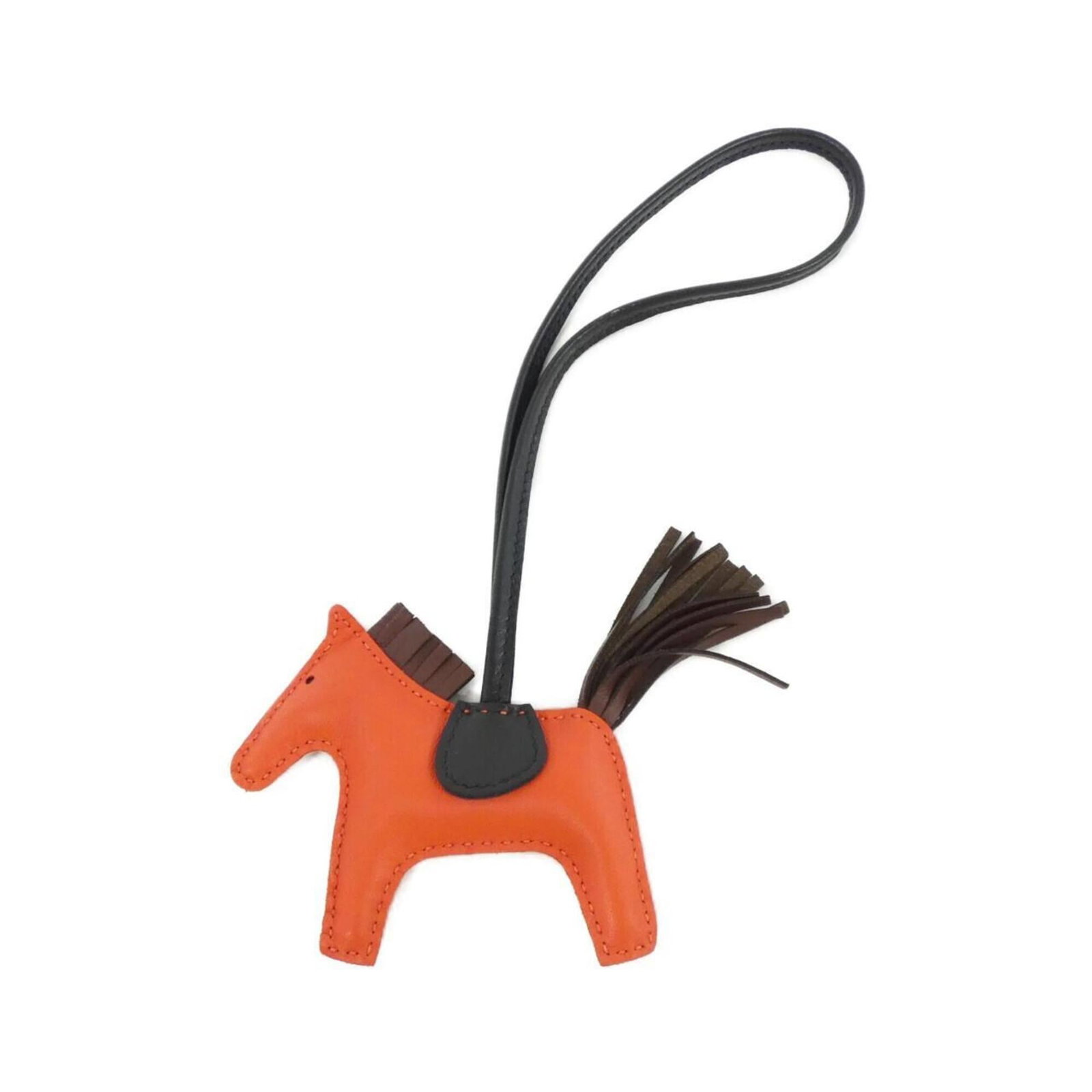 Hermes Handbag Charm Agneau Milo: Hermes Handbag Charm Agneau Milo Agneau Milo, the iconic Hermes handbag charm, adds a touch of elegance to any outfit with its sleek design and premium Agneau Milo material. This versatile charm