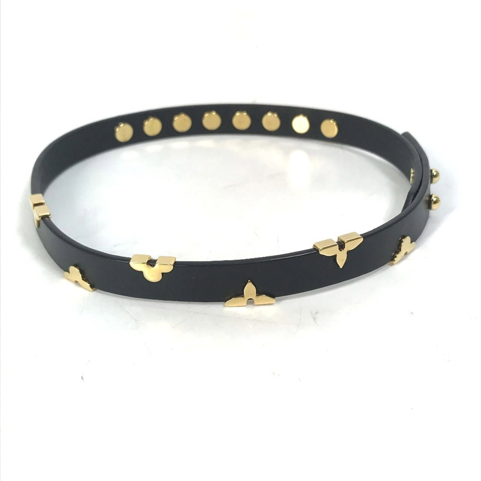 Charm Vuitton Leather Bracelet: Charm Vuitton Leather Bracelet Charm Vuitton Leather Bracelet in black and gold features a sleek design with a width of 1cm. The bracelet measures 38.5cm in total length, offering a stylish accessory
