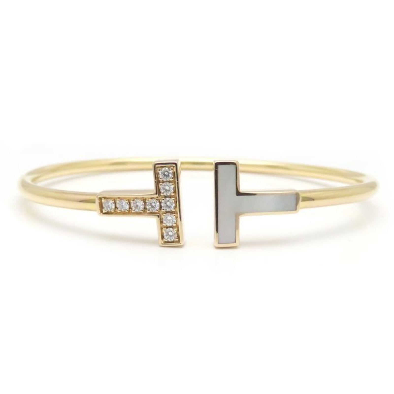 Rose Gold Bangle Tiffany: Rose Gold Bangle Tiffany Rose Gold Bangle Tiffany - A luxurious 18K rose gold bangle with a sleek design, measuring 14.5cm in length and bearing the signature of its maker. This high-quality item has
