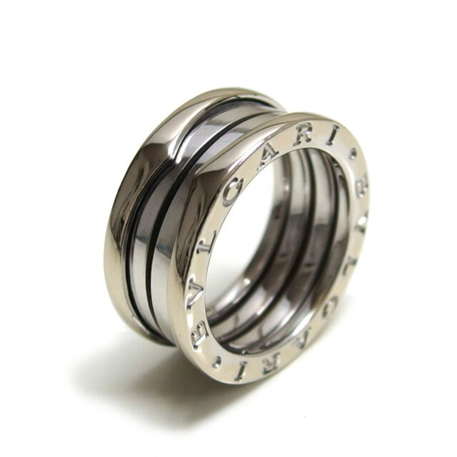 Bvlgari Band Ring White Gold (18K): Bvlgari Band Ring White Gold (18K) Bvlgari Band Ring White Gold (18K) features a sleek design with a signature from the artist, showcasing the luxury brand's attention to detail. Made from high-qualit