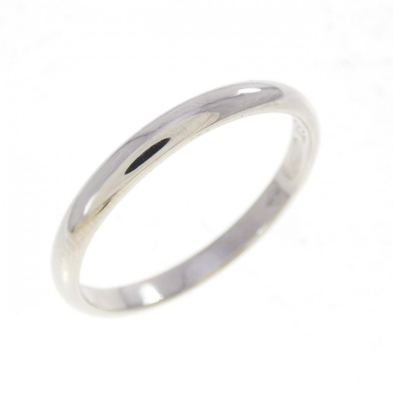Ring Band by Platinum 950: Ring Band by Platinum 950 Made from durable Platinum 950, this Cartier band ring offers a sleek and sophisticated design. With a brand size of 54 and US size 7, it provides a comfortable fit for