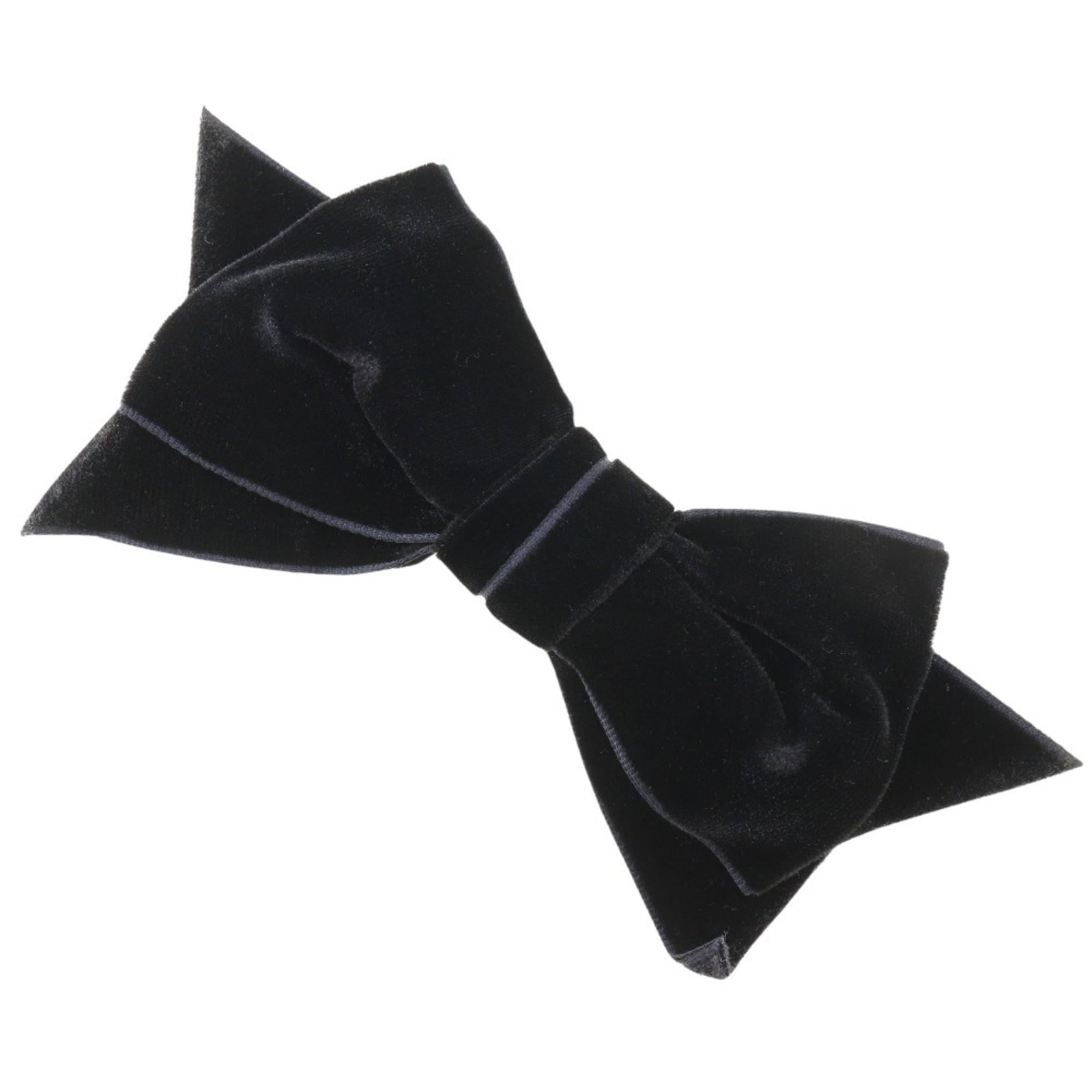 Chanel Brooch: Chanel Brooch This black Chanel brooch bears the signature of its creator, with visible scratches and signs of usage. The piece has been well-loved over time, adding to its unique character. Its