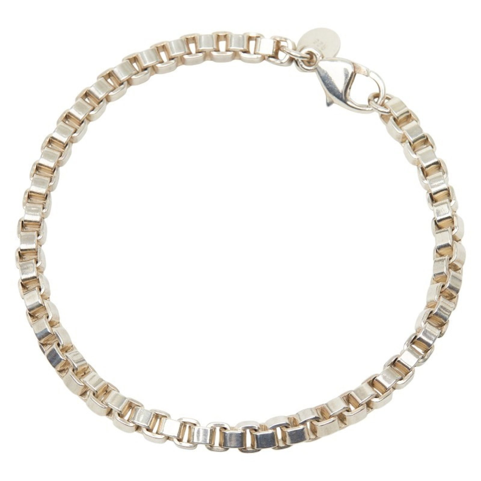 Charm Tiffany Bracelet 925 Silver: Charm Tiffany Bracelet 925 Silver Charm Tiffany Bracelet 925 Silver - A pre-owned, sterling silver charm bracelet with a classic design. Measuring 18cm in length, it features subtle signs of wear and