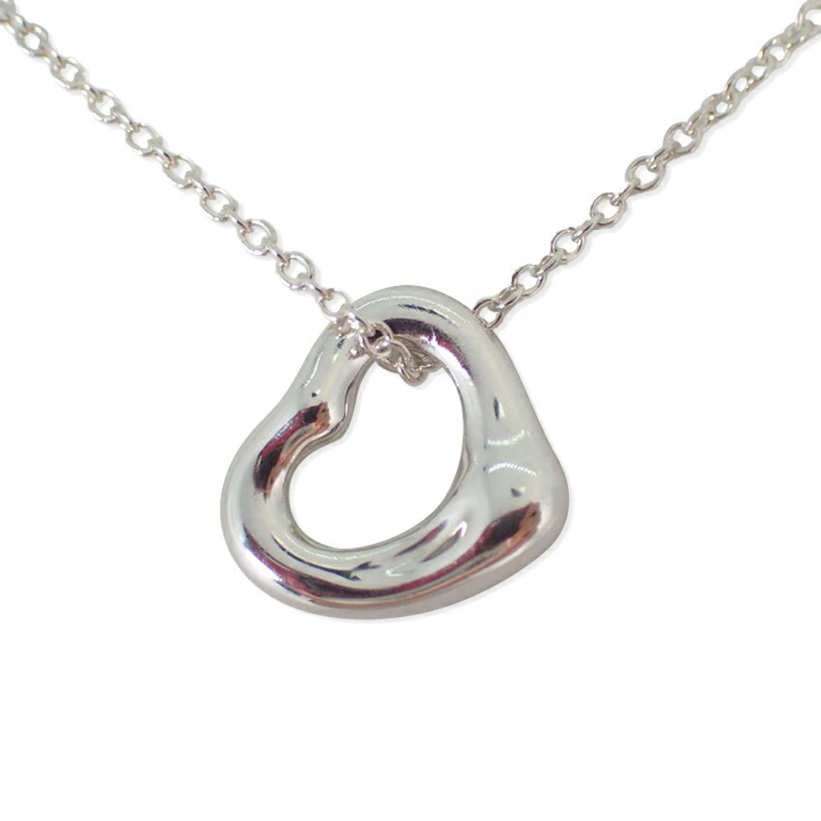 Tiffany 925 Heart Pendant Necklace: Tiffany 925 Heart Pendant Necklace Sterling silver pendant necklace with a heart-shaped design, measuring 10.3mm x 11.2mm and set in a 41cm sterling silver chain. The necklace bears a Tiffany hallmark