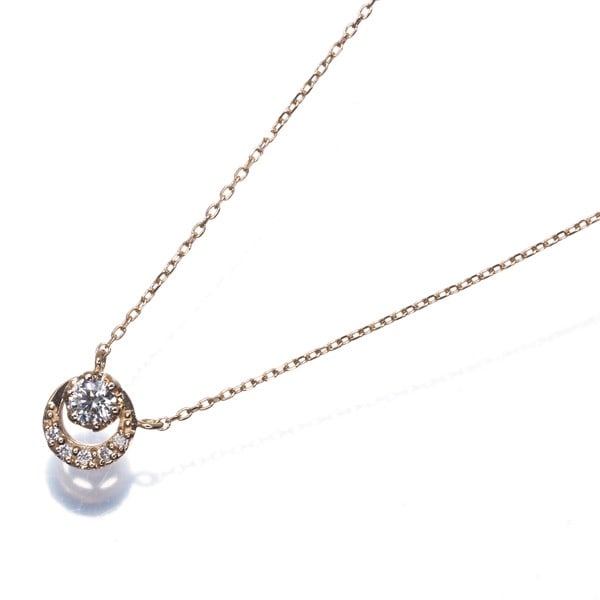 Diamond necklace moon rose gold 750 vendome: Diamond necklace moon rose gold 750 vendome Rose gold moon pendant necklace features a natural diamond set in Vendome's 18k rose gold. The delicate design showcases the beauty of the diamond, suspende