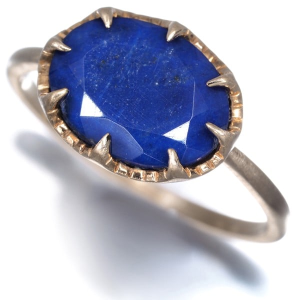 Agete Ring Lapis Lazuli Textured Us5 10K 416 Yellow Gold: Agete Ring Lapis Lazuli Textured Us5 10K 416 Yellow Gold Agete's 10k yellow gold ring showcases a stunning natural Lapis Lazuli stone, its textured surface adding depth to the piece. The US5 size