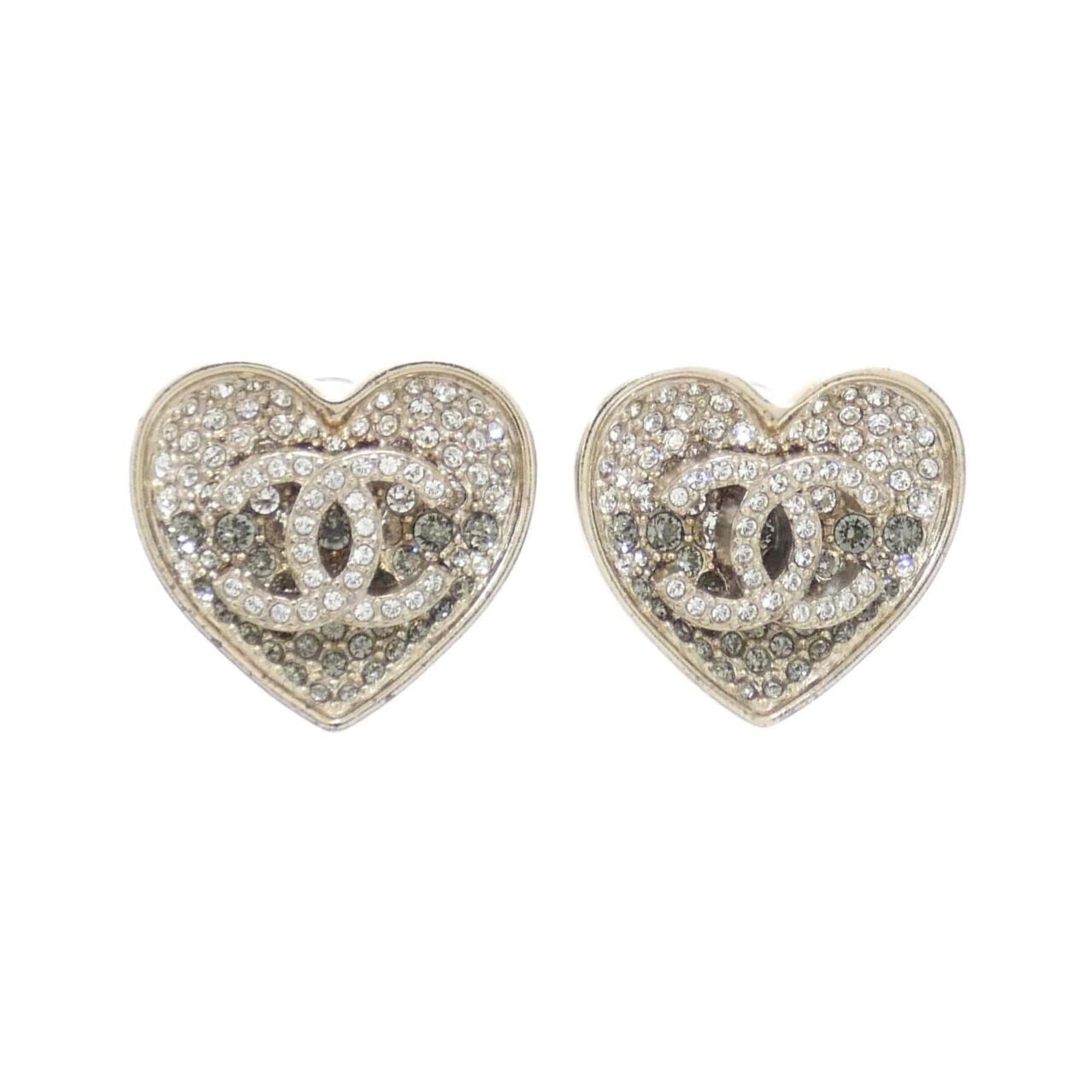 Chanel Clip Earrings: Chanel Clip Earrings Chanel Clip Earrings in gold and gray, featuring crystal stones. These clip earrings showcase the iconic Chanel design with a subtle touch of elegance. With a few traces of usage 
