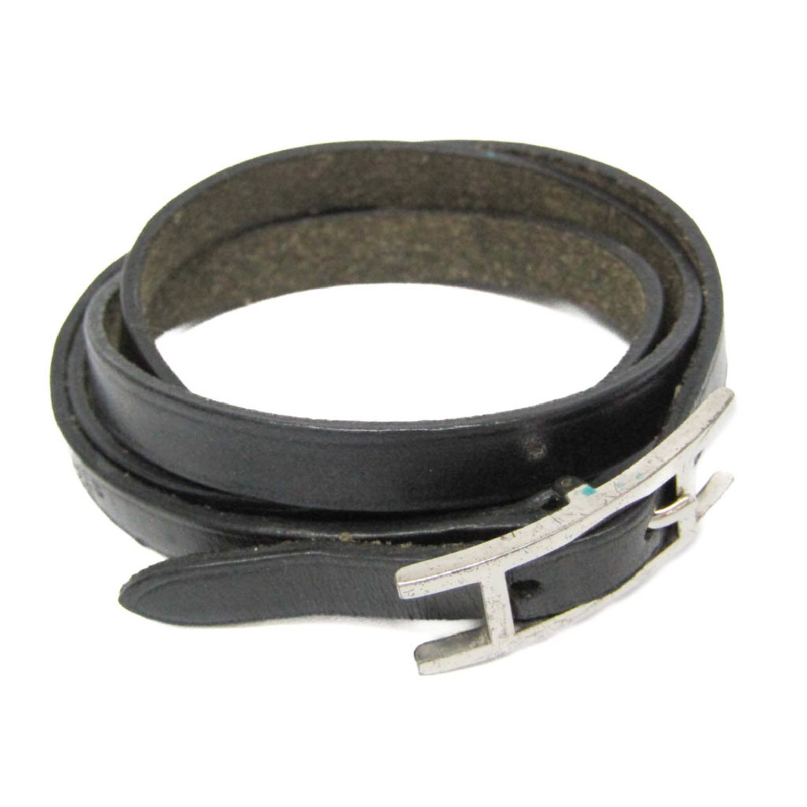 Metal leather bangle Hermes: Metal leather bangle Hermes Metal leather bangle from Hermes, featuring box calf leather and metal accents in black and silver. This casual bangle measures 14.5-15.5cm in length and has a width of 7mm