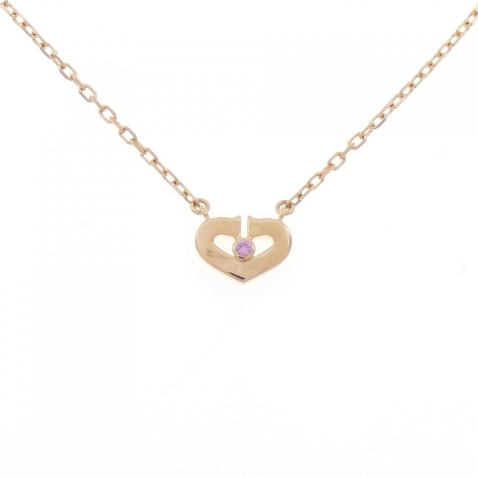 Heart Necklace from Cartier: Heart Necklace from Cartier Pink gold (18K) pendant from Cartier features a beautiful sapphire stone, suspended from a necklace with a 39 cm / 15.35'' circumference. The pendant measures 7.1mm x