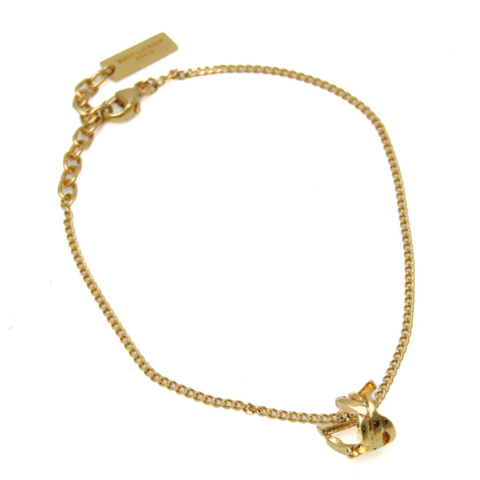 Saint Laurent metal bracelet: Saint Laurent metal bracelet Gold Saint Laurent metal bracelet, available in lengths of 16.5cm to 19.5cm, bearing the brand's signature style with a metal construction and gold finish. This used item