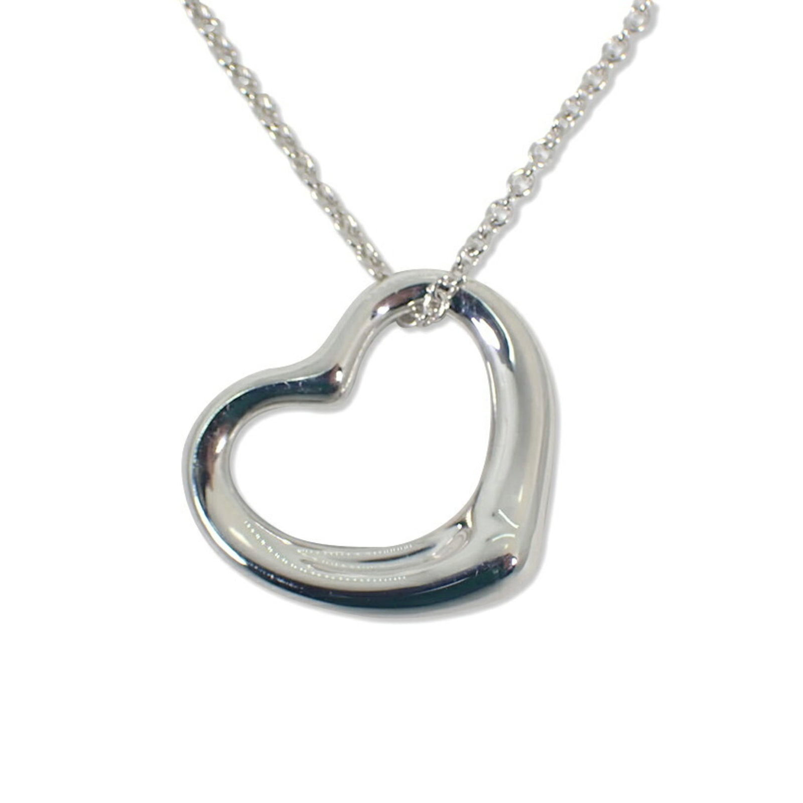 Tiffany 925 Heart Pendant Necklace: Tiffany 925 Heart Pendant Necklace Sterling silver 925 heart pendant necklace, crafted by Tiffany. The necklace features a 41.5 cm circumference and an 18.8mm x 22mm pendant with a few traces of usage