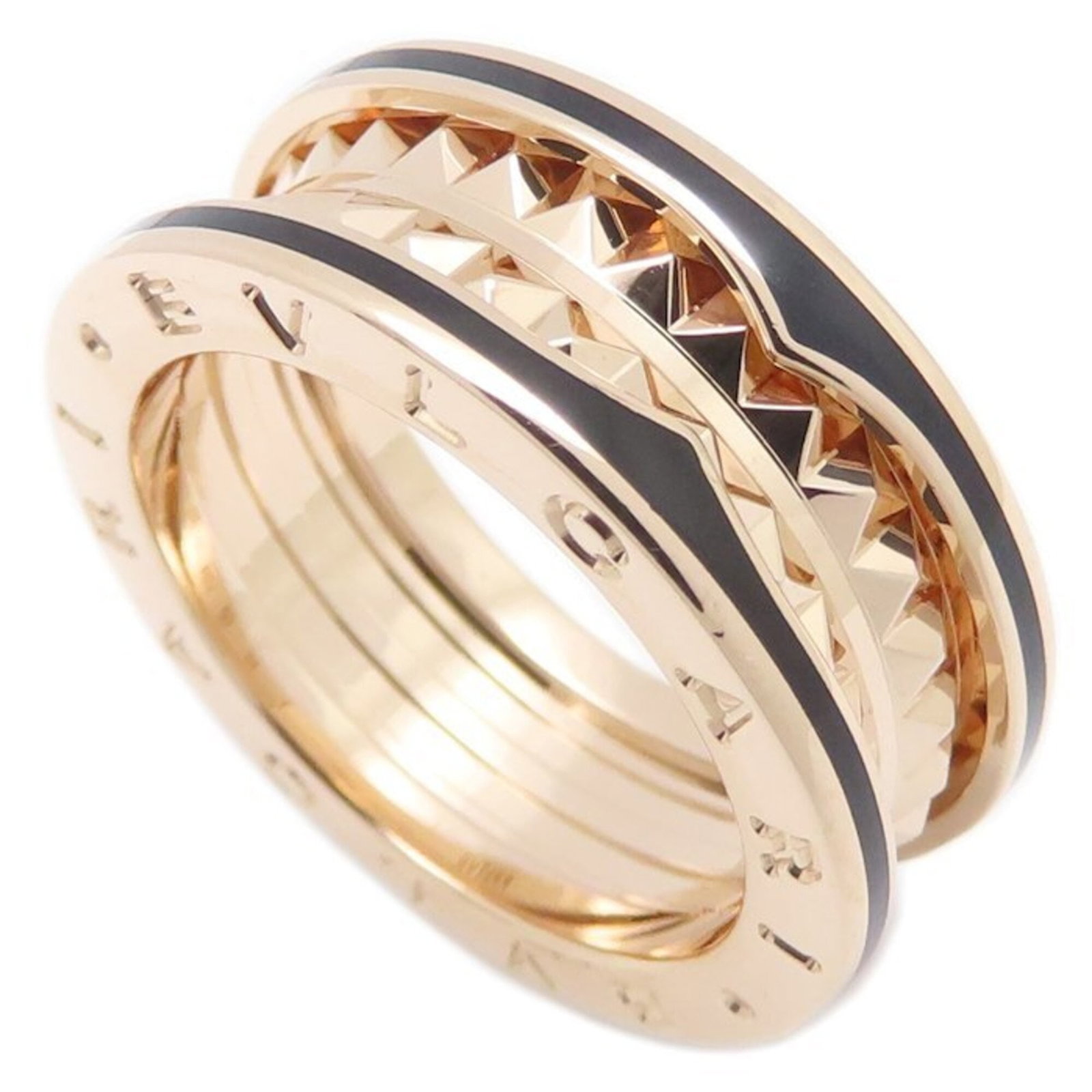Pink Gold Ceramic Band Ring By Bvlgari: Pink Gold Ceramic Band Ring By Bvlgari Pink Gold Ceramic Band Ring By Bvlgari features a striking pink gold band crafted from high-quality ceramic, adding a touch of elegance to any outfit. This 18K p