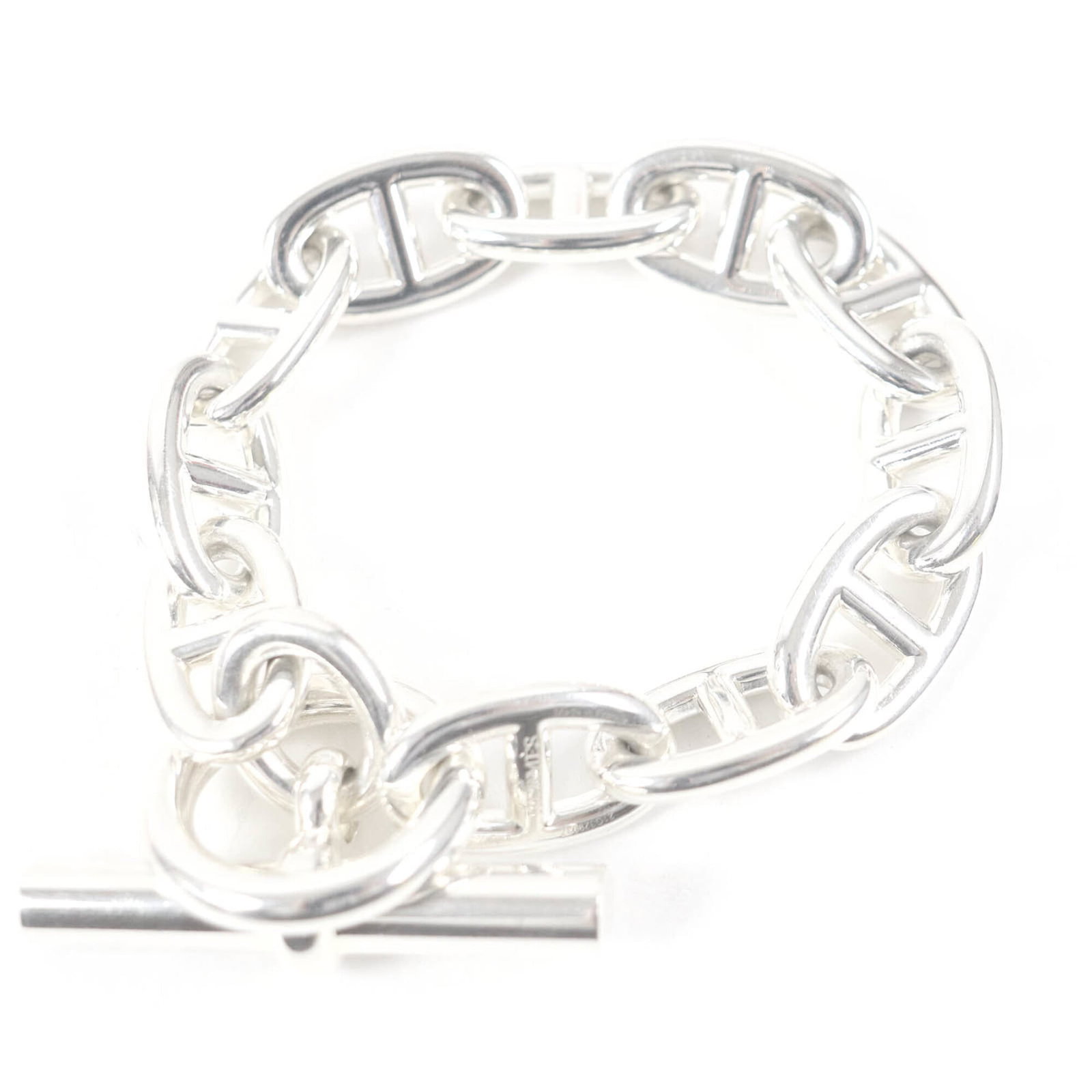 Silver Charm Bracelet 925 by Hermes: Silver Charm Bracelet 925 by Hermes Silver Charm Bracelet 925 by Hermes - A Timeless Accessory. This sterling silver charm bracelet, made from high-quality 925 material, features a sleek design with