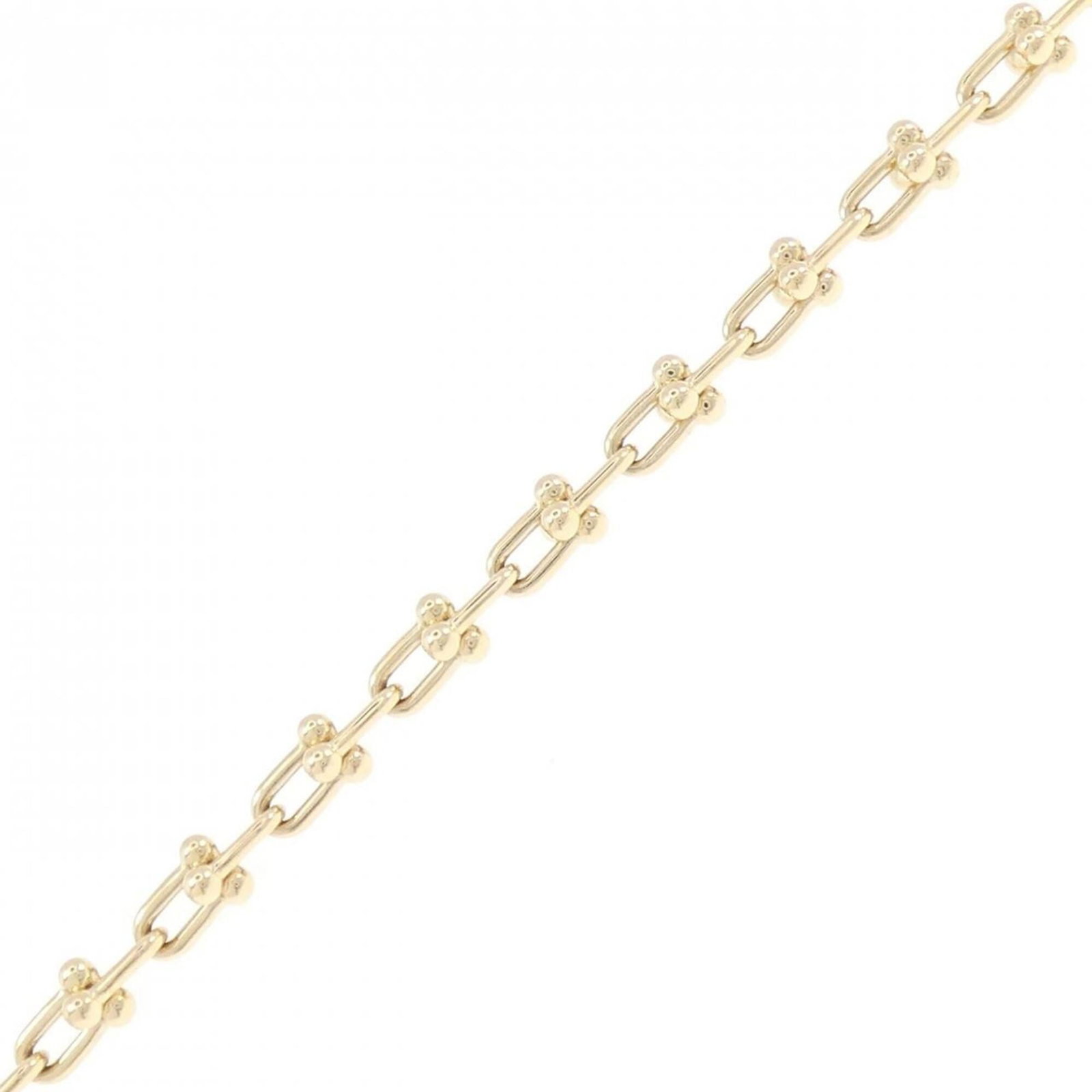 Tiffany Charm Bracelet Yellow Gold (18K): Tiffany Charm Bracelet Yellow Gold (18K) Tiffany Charm Bracelet Yellow Gold (18K) - A beautiful, pre-owned charm bracelet crafted from high-quality yellow gold. The 18cm length features a few traces