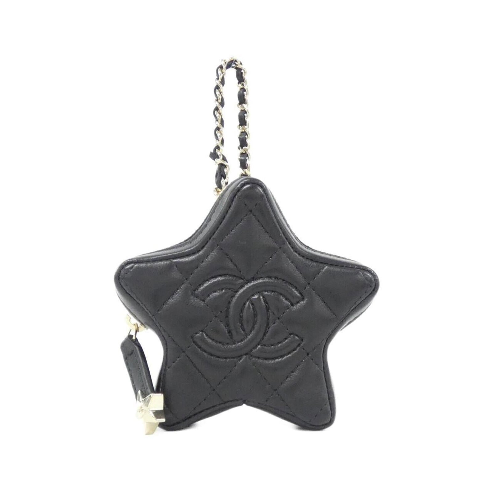 Chanel Handbag Charm Leather: Chanel Handbag Charm Leather Chanel Handbag Charm Leather is made from lambskin leather and features a black color. It measures 100mm x 100mm / 3.94'' x 3.94''. The charm has some scratches and dirt,