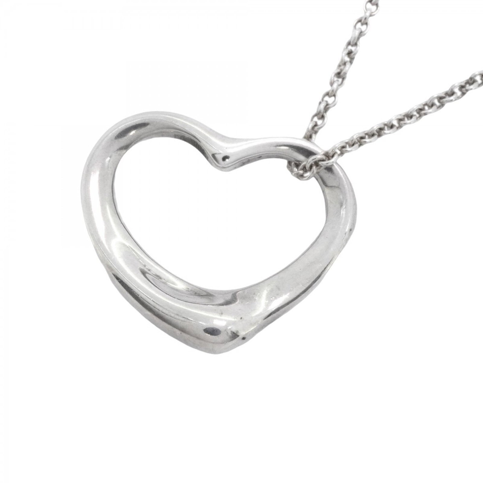 Women's Sterling Silver 925 Tiffany Co.: Women's Sterling Silver 925 Tiffany Co. Sterling silver necklace from Tiffany Co. features a pendant made of 925 silver, measuring 18.6mm x 22.2mm. The necklace has a 41 cm / 16.14'' neck circumferenc
