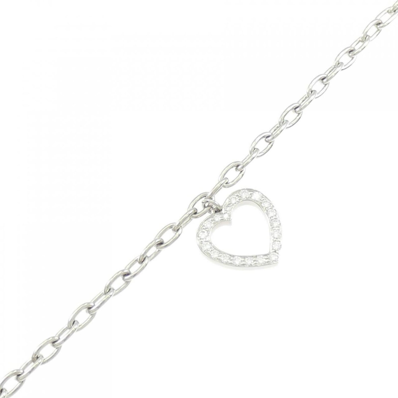 Platinum ring by Tiffany band: Platinum ring by Tiffany band Platinum ring by Tiffany features a diamond stone set in a band design. The item is made from platinum and has a US size of 9, with some minor scratches and dirt visible 