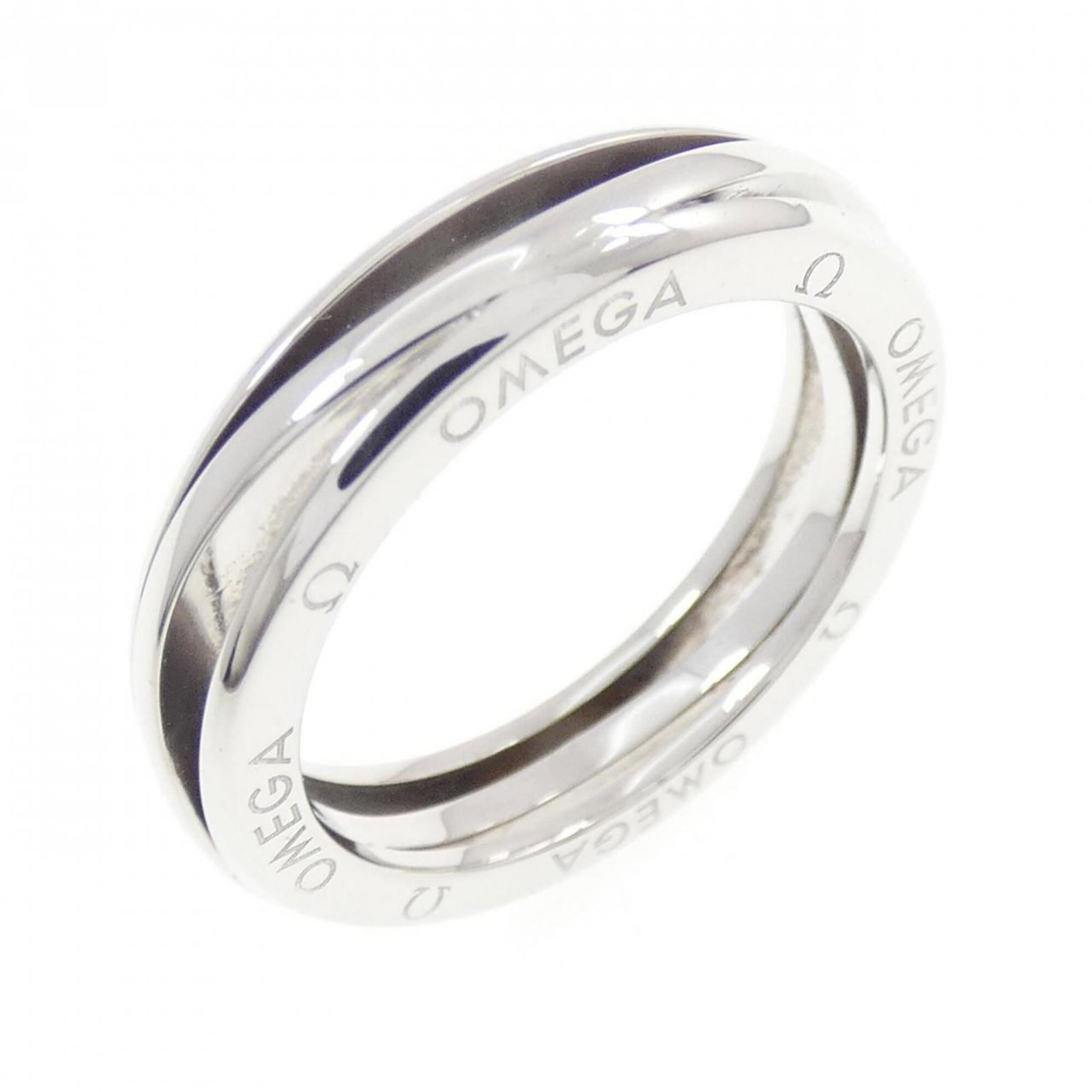 Omega Band Ring White Gold (18K): Omega Band Ring White Gold (18K) Omega Band Ring White Gold (18K) is a 48mm band ring made from high-quality white gold. This used item bears some signs of usage, with a few traces of scratches and di