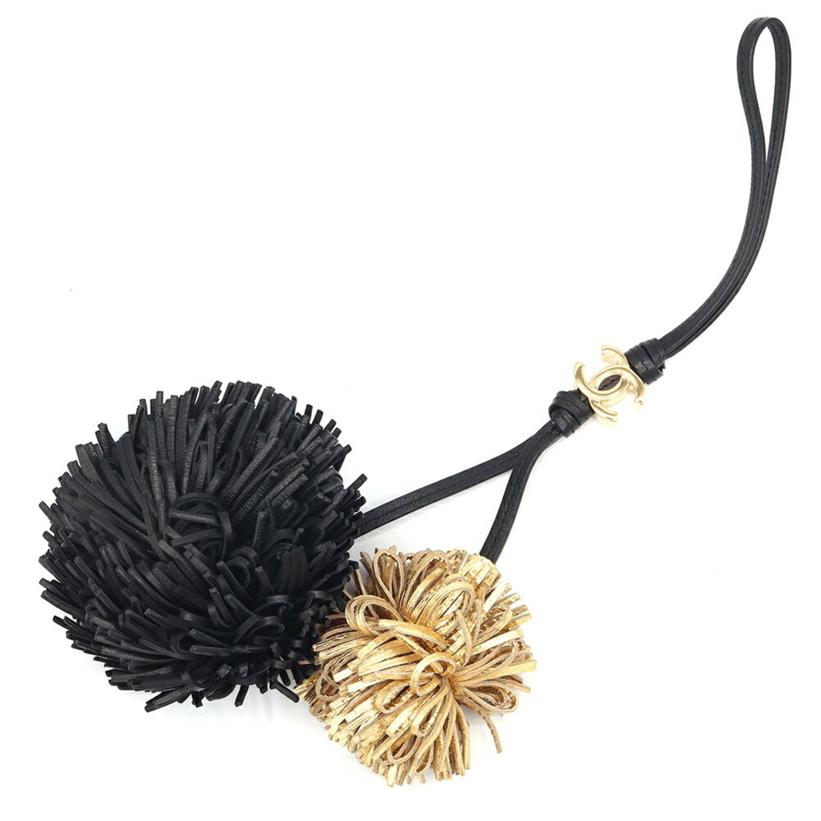Chanel Handbag Charm Leather Metal: Chanel Handbag Charm Leather Metal This Chanel Handbag Charm features a sleek black and gold design, showcasing the iconic brand's signature style. Made from high-quality leather and metal, it has a w
