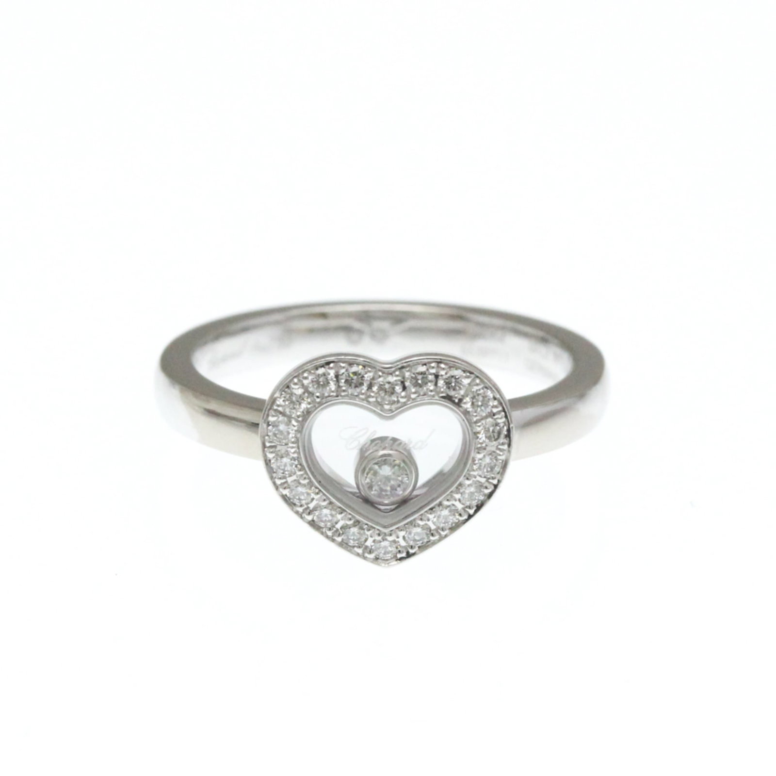 Chopard 18k White Gold Band Ring: Chopard 18k White Gold Band Ring Chopard's 18k white gold band ring boasts sleek lines and sophistication, featuring a high-quality diamond set in a sturdy yet elegant design. The ring's 9.30mm x 10.5