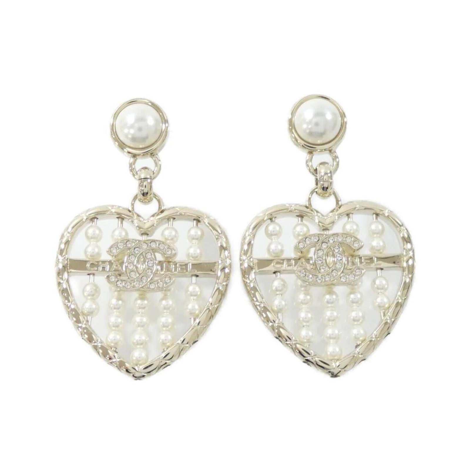 Chanel Stud Earrings: Chanel Stud Earrings Chanel Stud Earrings are available in gold and white, featuring a classic design with a subtle stud shape. Measuring 50mm x 30mm, they offer a stylish addition to any outfit. In v
