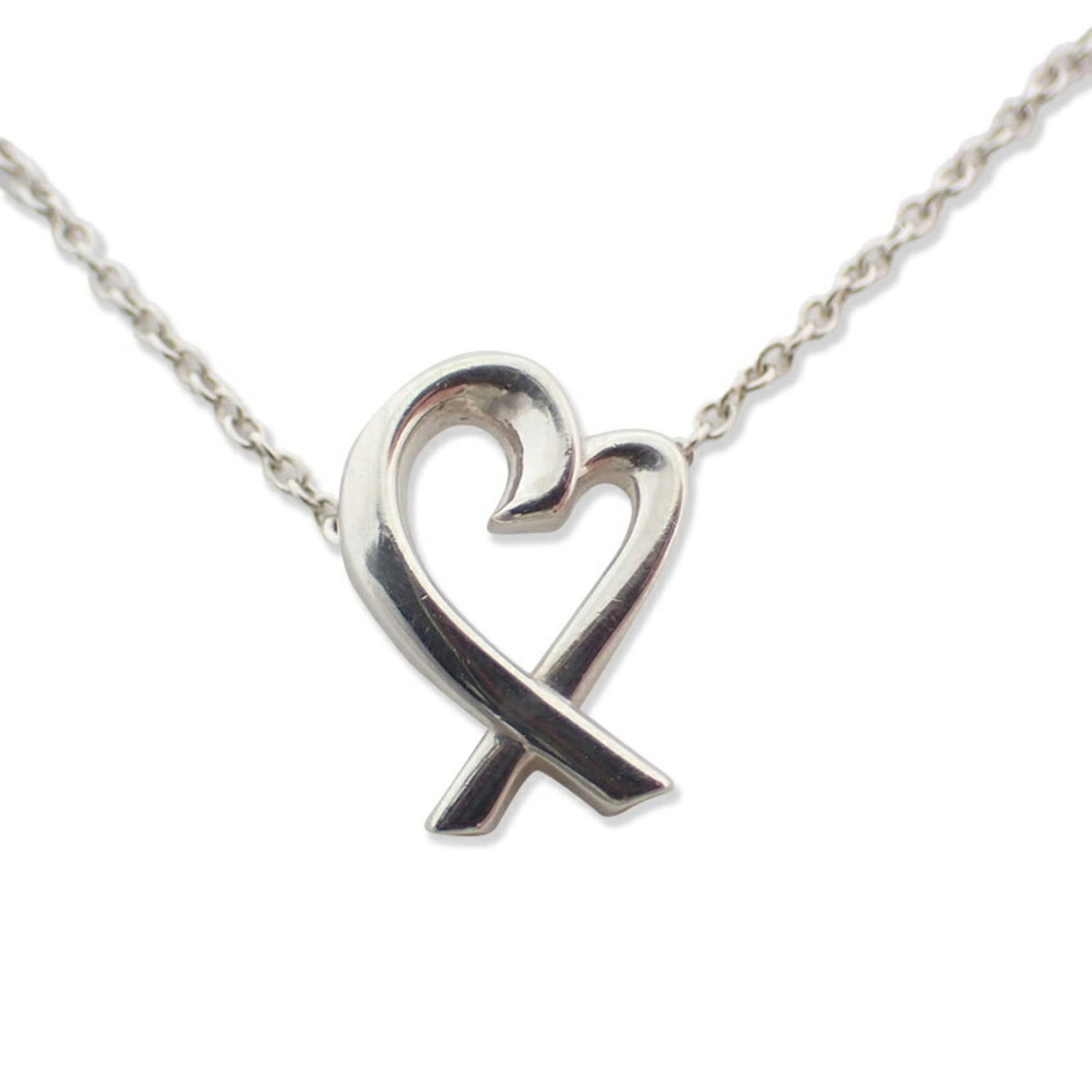 Loving Heart Pendant Necklace by Tiffany Co 925: Loving Heart Pendant Necklace by Tiffany Co 925 Sterling Silver 925, the Loving Heart Pendant Necklace by Tiffany Co boasts a beautiful design with a 12mm x 9mm pendant. Made from high-quality sterlin