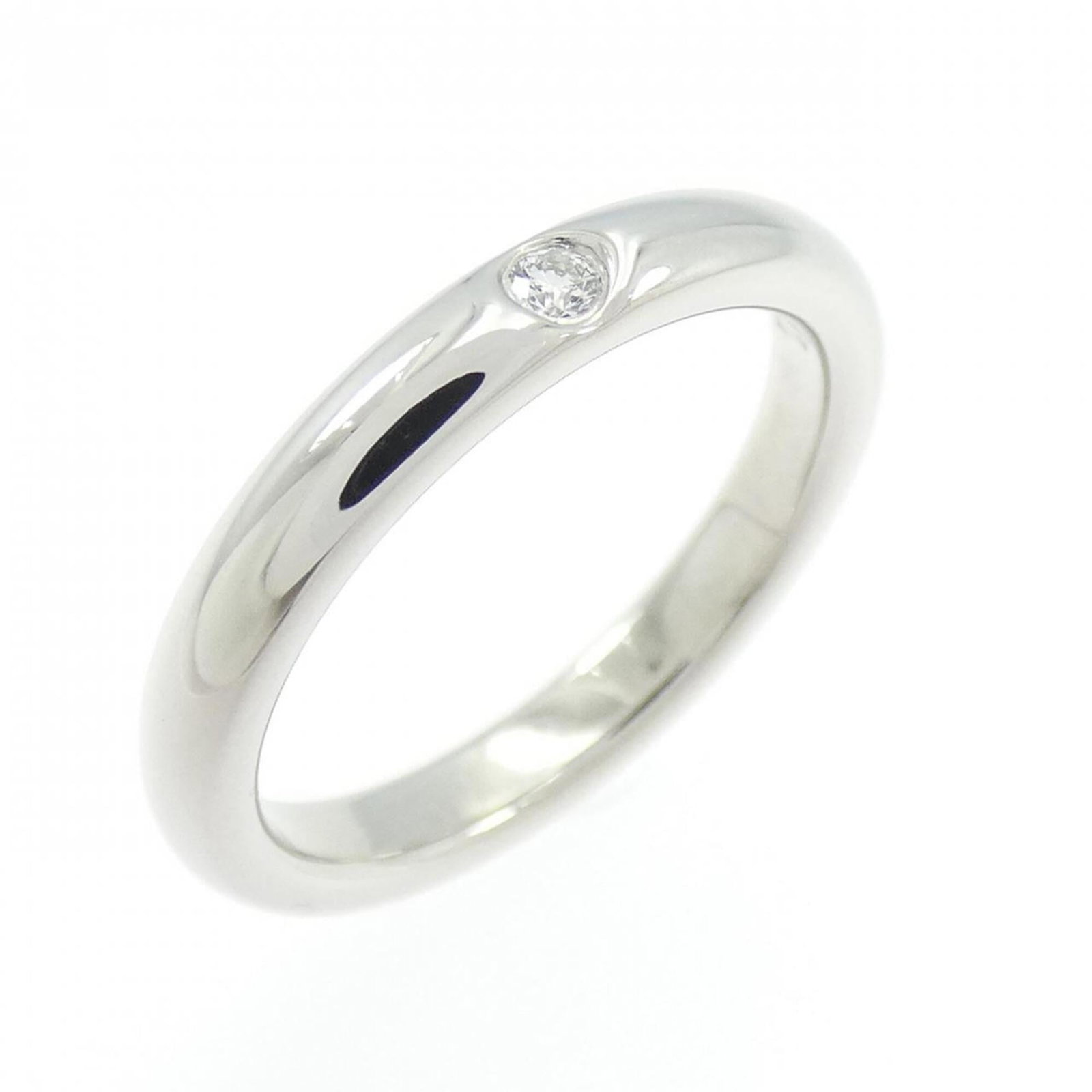 Platinum ring by Tiffany band: Platinum ring by Tiffany band Platinum ring by Tiffany features a diamond stone set in a band style ring, crafted from high-quality platinum material. The item is available in US size 4 and has been c