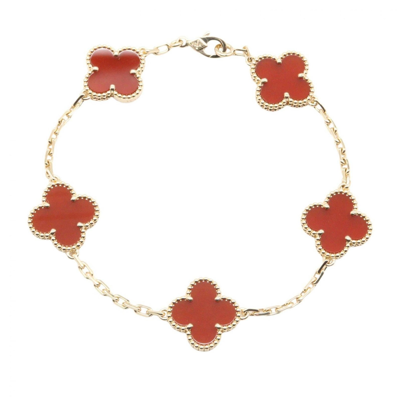 Charm Bracelet Gold Yellow Van Arpels Cleef: Charm Bracelet Gold Yellow Van Arpels Cleef Yellow Gold Van Cleef & Arpels Charm Bracelet with Carnelian Stone, featuring a vibrant red carnelian stone set in 18K yellow gold. This used charm bracelet