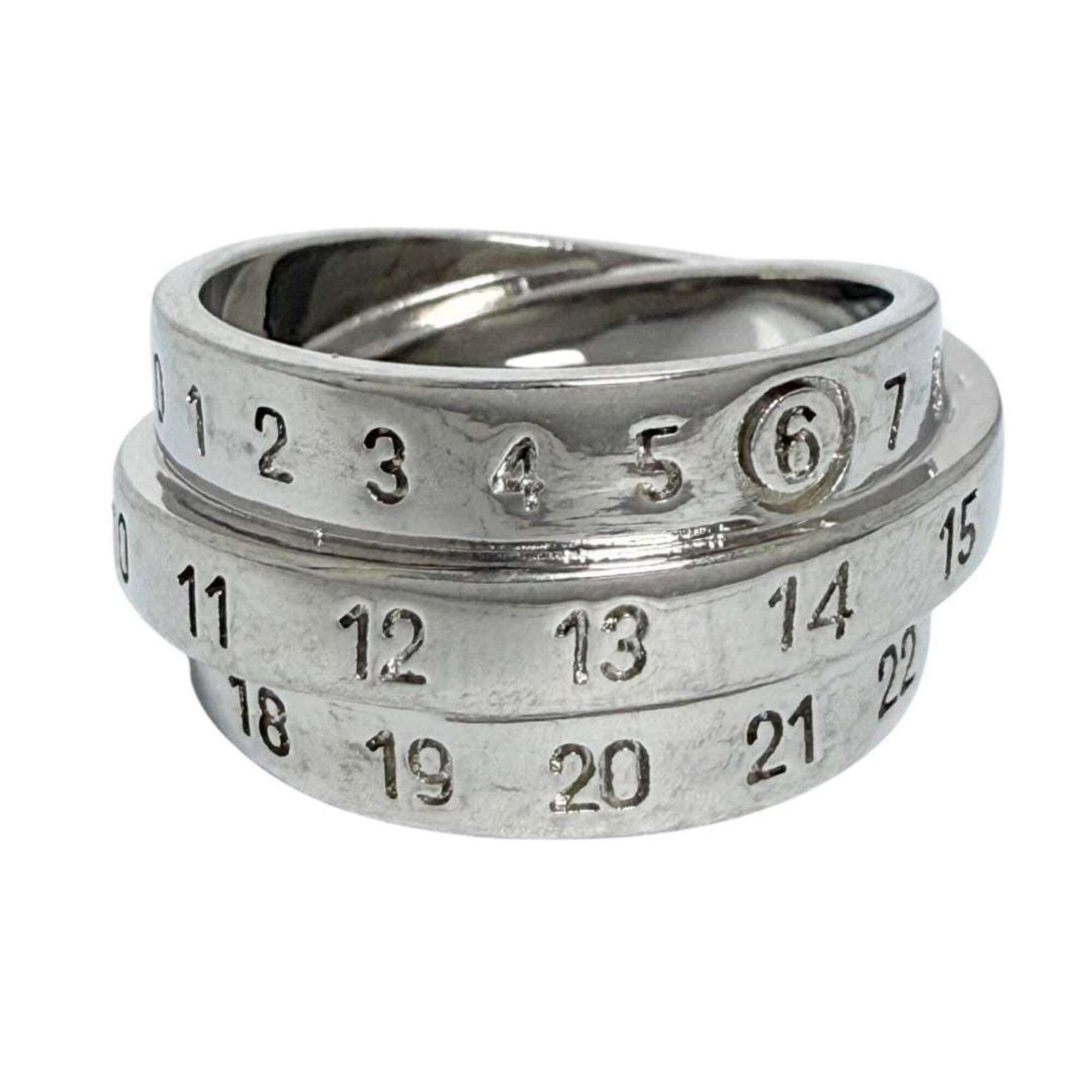 Margiela Band Ring Metal: Margiela Band Ring Metal Made from metal, the Maison Margiela Band Ring features a sleek design. With its used condition and some visible scratches/dirt, it still presents itself in very good conditio