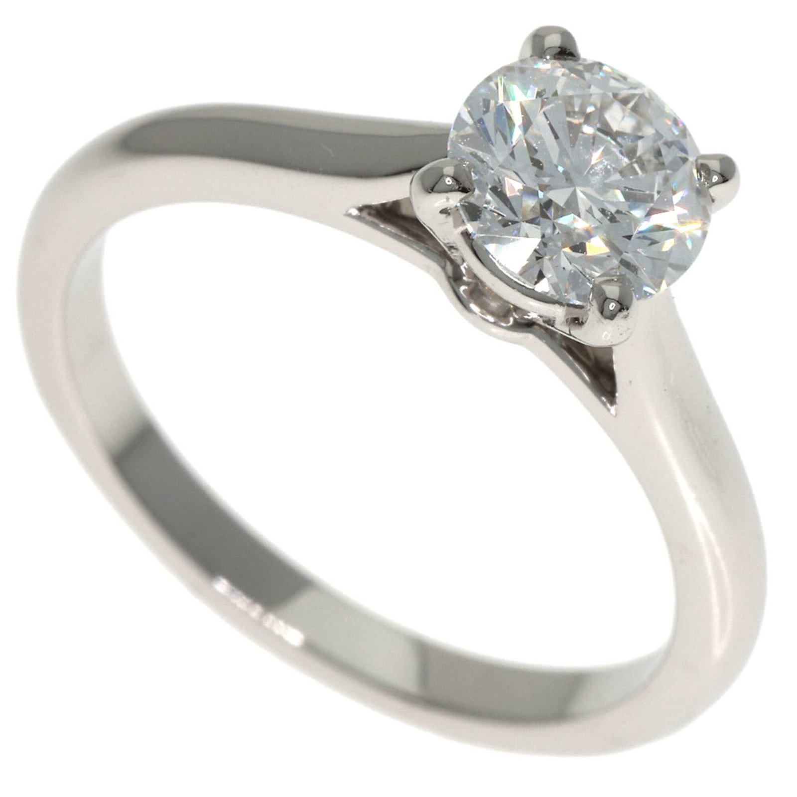 Cartier Band Ring: Cartier Band Ring Platinum band ring from Cartier, featuring a diamond stone and weighing 3.4g, falls within the US size 4. The ring showcases some scratches and dirt but remains in very good conditio