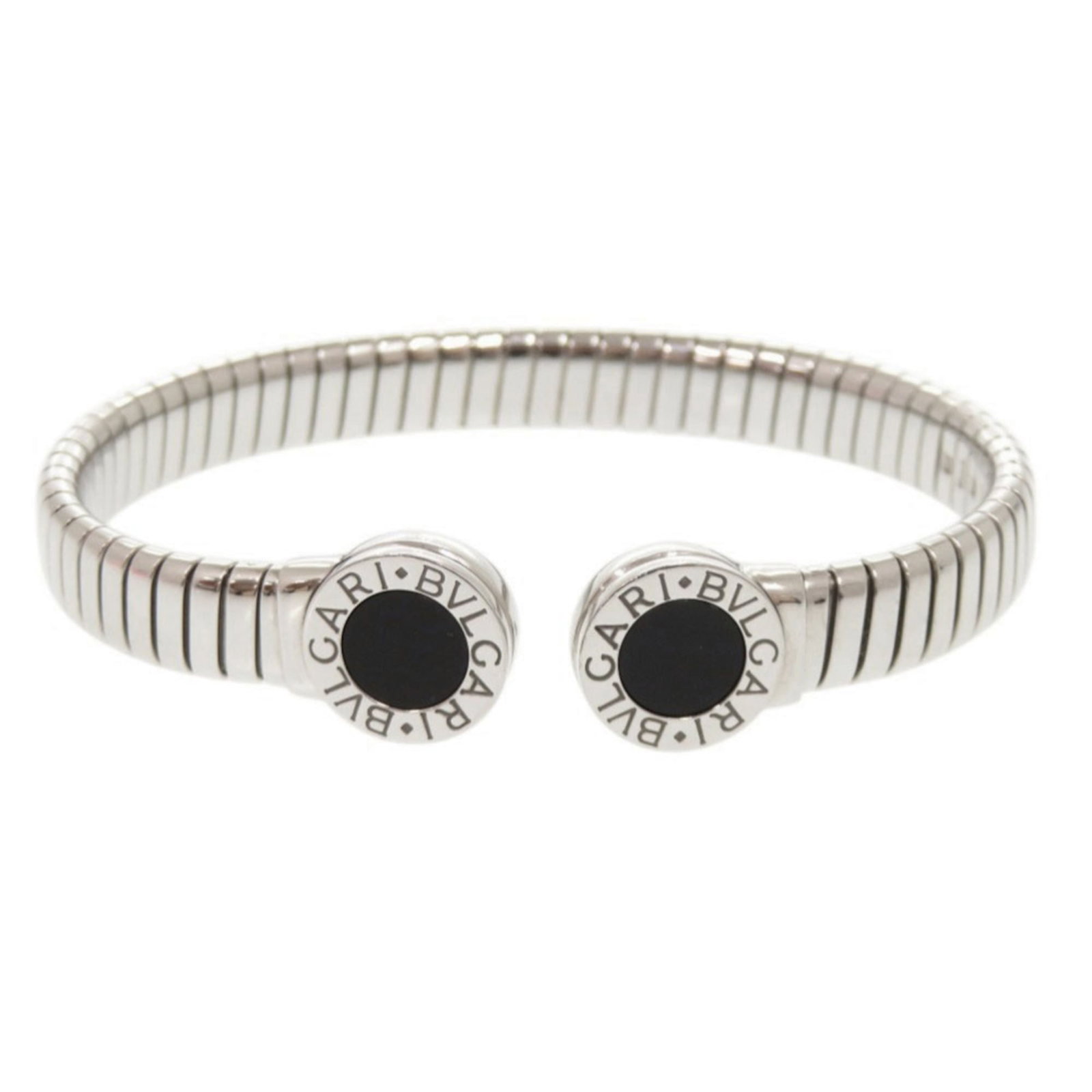 Bvlgari Bangle Stainless Steel: Bvlgari Bangle Stainless Steel Stainless steel bangle from Bvlgari, featuring a silver finish with traces of usage and minor scratches. The item shows signs of wear but remains in good condition. This