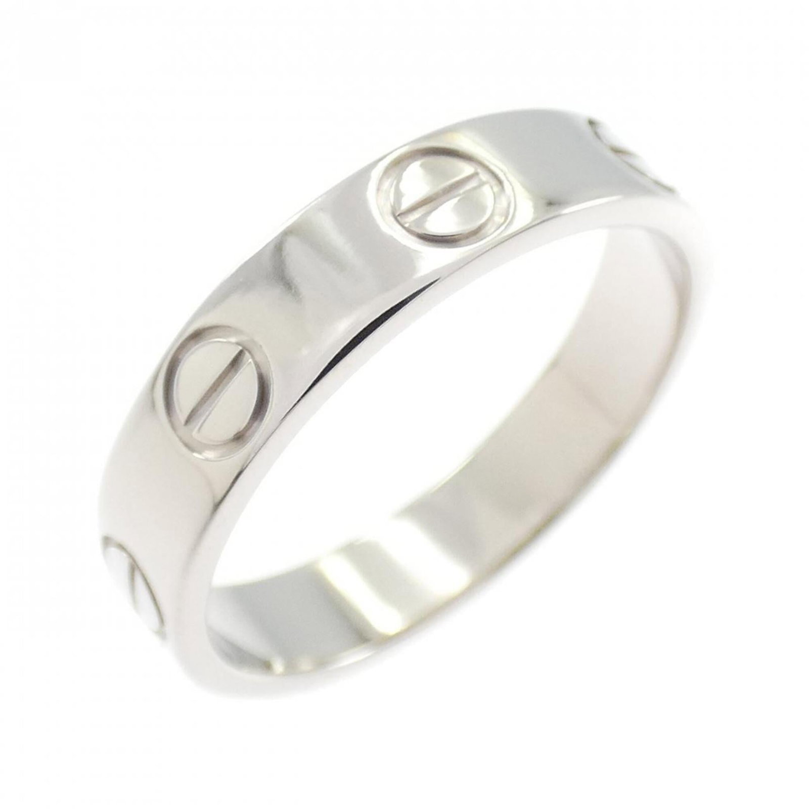 Love Ring from Cartier: Love Ring from Cartier White Gold (18K) Cartier Love Ring in excellent condition, bearing a few traces of usage and minor scratches. This classic design showcases the timeless elegance of Cartier's