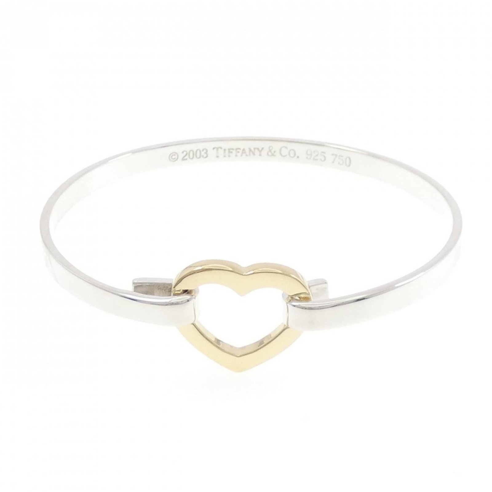 Tiffany Bangle Silver 925 Yellow Gold (18K): Tiffany Bangle Silver 925 Yellow Gold (18K) Silver 925, Yellow Gold (18K) bangle from Tiffany with a length of 16.5cm / 6.49'' and a nearly unused condition, bearing only minor signs of wear. This ban