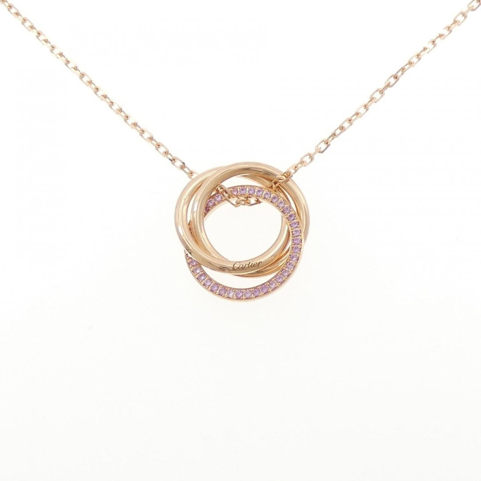 Trinity Cartier Necklace: Trinity Cartier Necklace Pink gold (18K) Cartier necklace featuring a beautiful sapphire pendant, available in sizes 42-45 cm. The necklace bears a few traces of usage and some minor scratches, but re