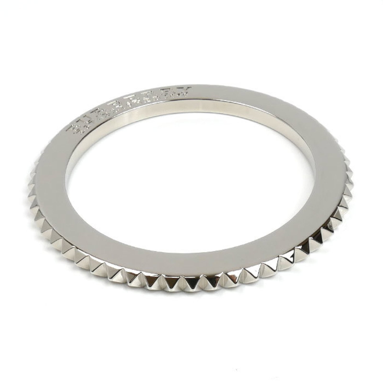 Metal Bangle Burberry: Metal Bangle Burberry This silver metal bangle from Burberry features a sleek design with a length of 20cm. The item shows signs of usage, including scratches and dirt, but remains in good condition