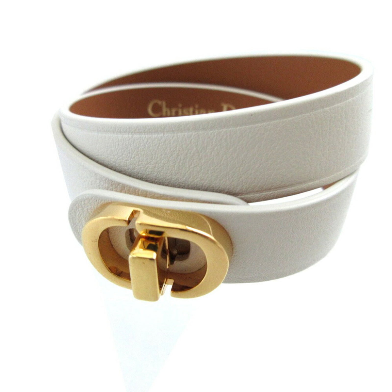Leather Charm Christian Dior Bracelet: Leather Charm Christian Dior Bracelet Ivory leather charm bracelet from Christian Dior, featuring a classic design with subtle elegance. Total length is 36.5cm, making it a versatile accessory for eve