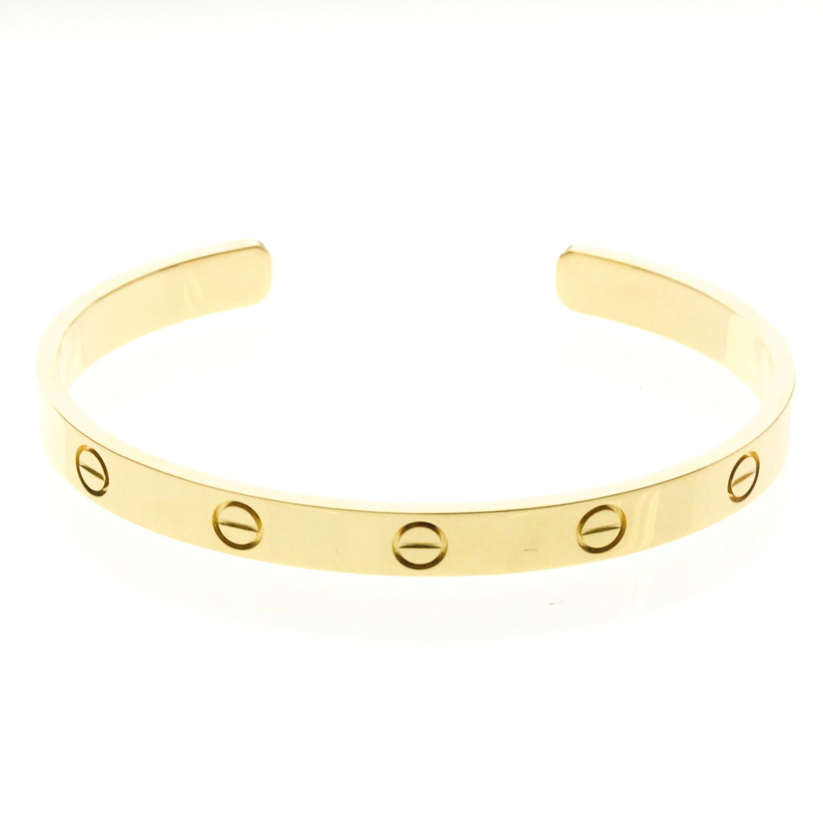 Cartier Bangle Yellow Gold (18K): Cartier Bangle Yellow Gold (18K) Cartier Bangle Yellow Gold (18K) - A timeless piece of fashion with a rich history, this 18k yellow gold bangle boasts a sleek design that exudes elegance. With its su